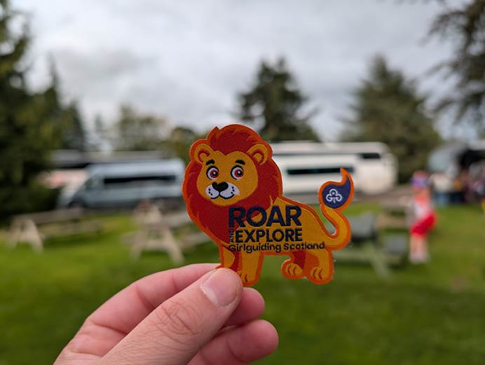 Roar and explore badge