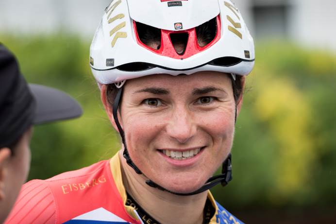 Dame Sarah Storey wearing a cycling helmet